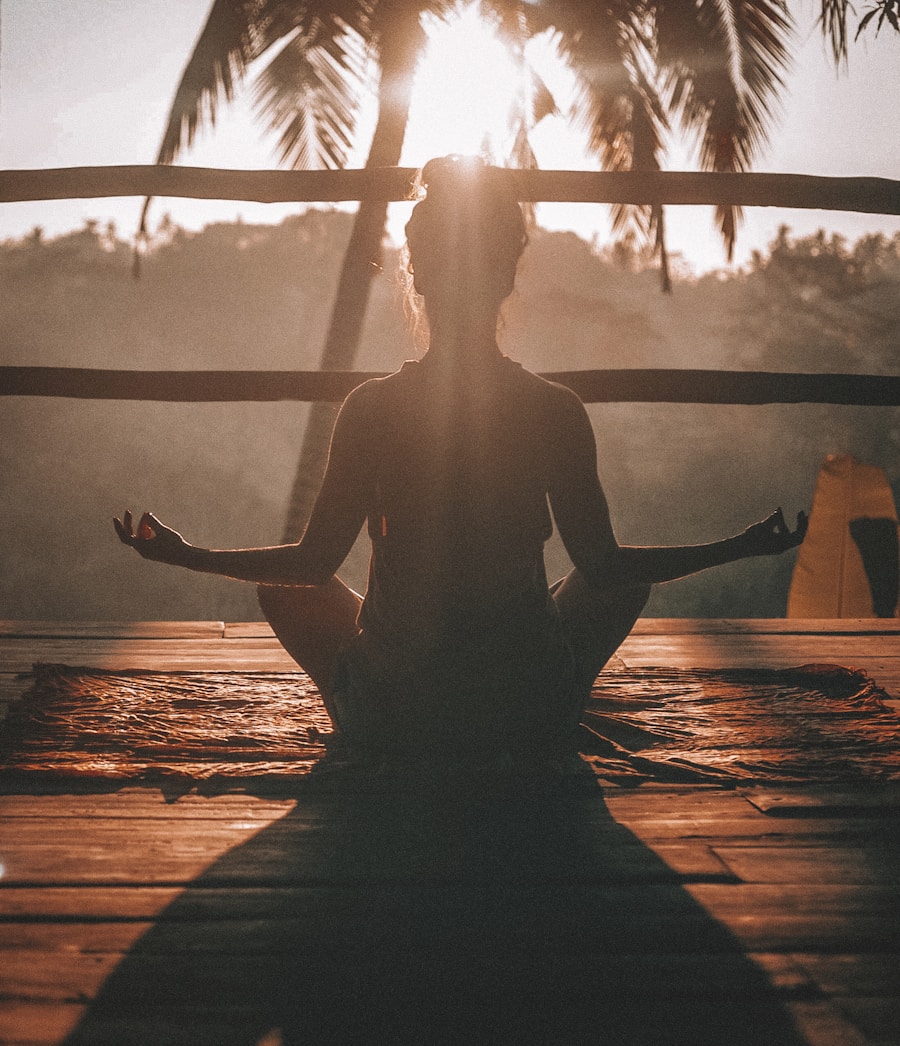Man doing morning exercise surrounded by green tropical nature